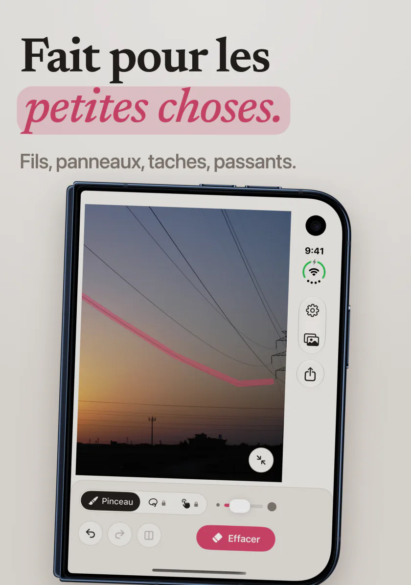 Mend sur iPhone Duo avec un trait rose le long d’une ligne électrique qui traverse le ciel du soir